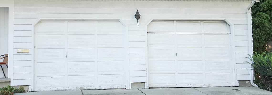 Roller Garage Door Dropped Down Replacement in North Miami