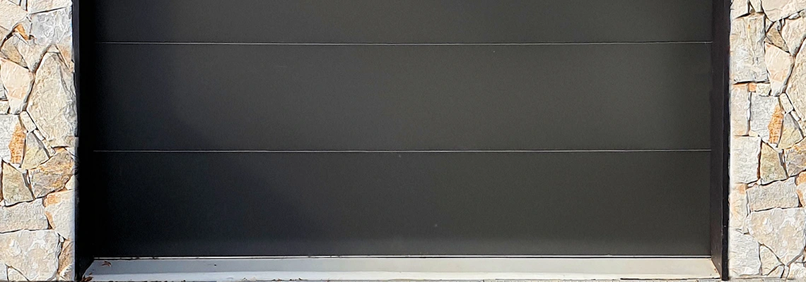 Overhead Black Garage Door Installation in North Miami, Florida
